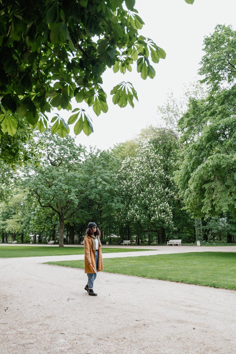 A person at a crossroads with two clear path signs: one labeled “Comfort” and the other “Growth.”