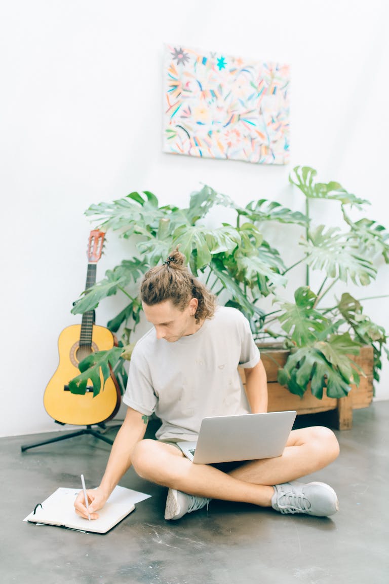 A focused person working in a quiet space, surrounded by minimal distractions.