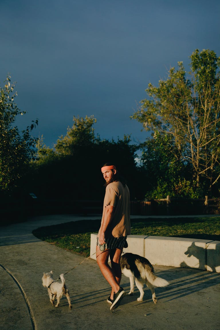 A person putting down their phone and walking outside in nature
