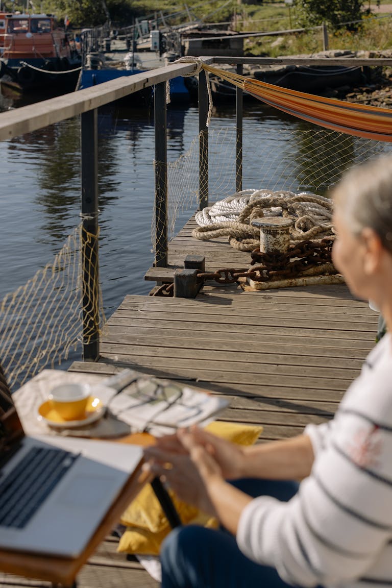 A calm workspace with a morning journal, a cup of coffee, and natural sunlight