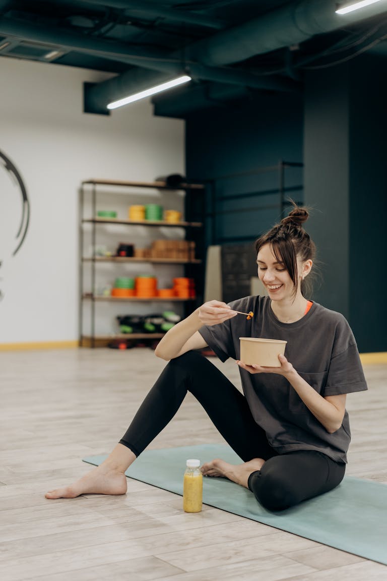 Someone enjoying a healthy meal slowly, without digital distractions.