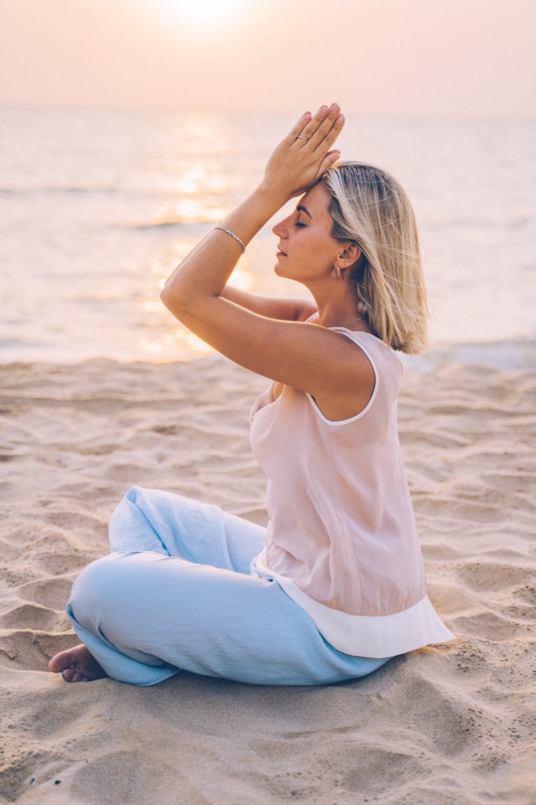 Sunrise with a person meditating or journaling
