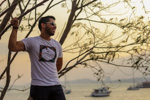 A person enjoying a peaceful moment away from technology, perhaps outdoors, surrounded by nature or in a calming environment.