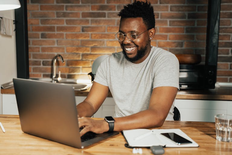A person working on their personal brand, like updating their LinkedIn profile, or a professional with a strong online presence.