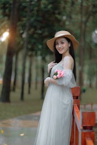 A person holding a stop sign with a calm smile, representing boundaries with grace.