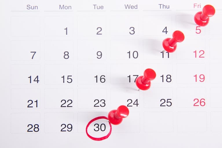 A calendar with blocks of time filled in, showing a well-organized day.