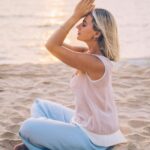 Sunrise with a person meditating or journaling