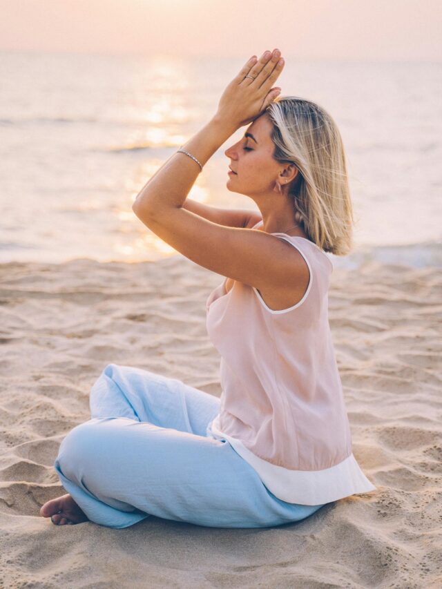 Sunrise with a person meditating or journaling